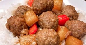 Hawaiian meatballs with pineapple and bell peppers on white rice